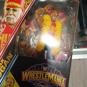 WWE Hulk Hogan Figure in Red and Yellow Attire